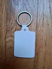 Exxon Superflo Motor Oil Key Chain