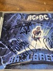 Ac dc Signed Ballbreaker Cd - Angus  Malcolm Young   Phil Rudd - Houston 1996