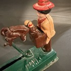 Vintage Cast Iron Monkey Bank Mechanical Coin Bank  works 
