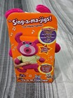 Rare Sing-a-ma-jigs V6415 Pink Flower Eyes Sings    a Tisket A Tasket    Brand New