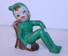 Vintage Japan Pixie Elf Green Leaning Against A Stump