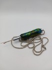    handcrafted Resin Seam Ripper Necklace     Swirled Emerald   Gold Pendant