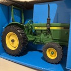 Ertl 581 John Deere Model Compact Utility Tractor Wide Front  1 16 Scale  1999