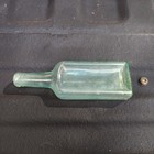 Antique Chas H Fletcher s Castoria Aqua Glass Embossed Medicine Bottle