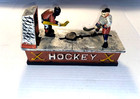 Cast Iron Mechanical Ice Hokey Coin Bank  Spring Loaded Lever