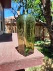 Rare African T  Co Gin Bottle With Embossed Serval Circa 1880s - 90s 