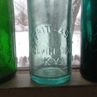 Covington ky Fritz   Son Arched Tombstone Slug Plate Blob Hutch Soda Bottle