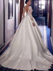 Sexy Wedding Dress Long Sleeve Backless Appliques Lace Beaded A Line Bridal Gown