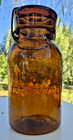 Amber Lightning Putnam Quart Fruit Jar W matching Amber Lid Shiny Nice