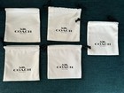 Coach New York Set Of 5 White Drawstring Jewelry Pouches