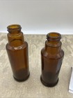 2 Vintage  Brown Glass Mini Bottles Collectibles 4      4 5    Tall