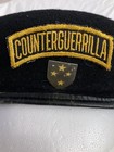 Vietnam Era Black Beret With Counterguerrilla Arc And Americal 23rd Division Pin