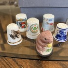 Lot Of 22 Thimbles Porcelain  Wood   Pewter Birds  Places  And Brands