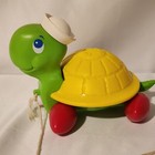Vintage 1977 Fisher Price Plastic Tag Along Turtle Pull Toy Red Legs
