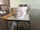 A Haviland France China Tea Cup  The Base Is White With Multicolored Flowers 