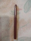 Caran Dache Matte Burgundy  Roller Ball Pen With A Brand New Black Cross Swiss