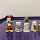 Ceramic Thimble Lot Of Eight- And Two Ceramic Figures