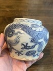 An Old Blue And White Porcelain Jar With Dragon Design