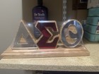 This Delta Sigma Theta Mirrored Acrylic Desk Topper