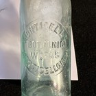 Monticello Bottling Works Bottle 8    Tall  Monticello Iowa Rare