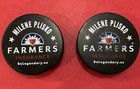 Two 2023-24 Game Used Usa National Development Team Game Pucks 