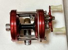 Ambassadeur 5000 Red Right Hand Drive Baitcasting Reel - New With Accessories
