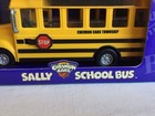 2001 Nib The Chevron Cars Sally School Bus Plastic Yellow Collectible Model Car