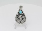 Sterling Silver And Turquoise Navajo Handmade Wolf Head Teardrop Pendant
