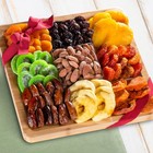 A Gift Inside Dried Fruit Assortment Almonds On Bamboo Cutting Board Serving