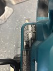 Makita Bundle - Xsr01 Power Saw  Two 18v Batteries  And Xb01 Power Sander