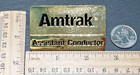 Amtrak Assistant Conductor Shiny Gold Tone Uniform Badge Pin H723