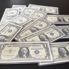      1957  1 Silver Certificate     Uncirculated To Gem Unc     Blue Seal   crisp Paper