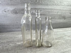 Lot Of 3 Unmarked Vintage Clear Bottles Various Shapes   Sizes