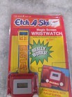 Vintage Etch A Sketch Magic Screen Wristwatch 1995 Pkg Open-yellow Strap