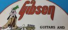Vintage Gibson Guitars - Acoustic Electric Bass Porcelain Gas Station Goofy Sign