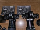 Canon 35 Mm Film Cameras 2 A-1 Models Extra Lenses Manuals Sunpak Lot Vintage 