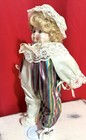 Vintage porcelain Doll In Clown Outfit  With Flower On Her Cheeks art Mark
