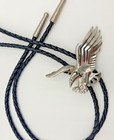 Vintage Eagle Bolo Tie     Silver-tone Flying Eagle Slide On Black Braided Leather