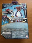 Transformers Earthspark Deluxe Starscream Mandroid Baf 6  Action Figure In Hand 