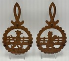 Vintage Copperized Cast Iron Trivet Set Amish Man   Woman Set Of 2