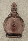 Purple Wheaton Glass Bottle Ball And Claw Bitters 