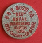 Vintage Wooden Nickel H   H Music Co   red  Novak Houston Texas 1970 s 1 75 d