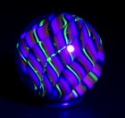 Bryan Trillas Glass Marble filigree Cane uv Reactive orange   Black 0 8-0 9 Inch