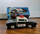 Vintage Police Sparkling Tin Squad Car Black white Friction Power Sparks 5 5 