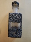This Vintage French Perfume Bottle A Clear Glass Body Encased In Metal Overlay 