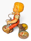 1930   s Wind-up Tin Toy Kiddy Cyclist In Working Condition