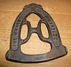Antique vintage Wh Howell Footed Cast Iron Trivet For Sad Iron Geneva Il Usa
