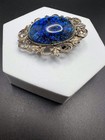 Vintage Ornate Silver Tone Lapel Pin Brooch Blue Foiled Glass Cabochon Japan