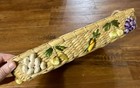Handwoven Basket With Decorative Vegetable Accents