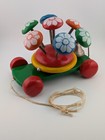Vintage Kouvalias Wooden Pull Toy Rotating Flowers  1970s Bell Colorful Mcm